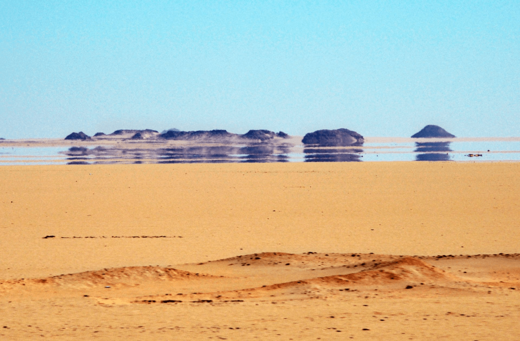 A mirage in the desert looks like water, but there is no water there.
