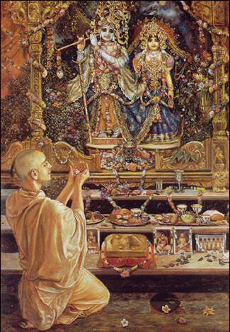 Brahmachari worships Radha Krishna